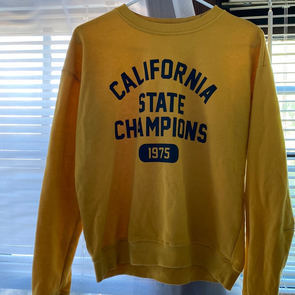 Small Gold colored Sweatshirt. Purchased at Garage.